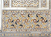 Decoration in Tomb of I'timād-ud-Daulah, Agra, showing correct treatment of sides and corners. A quarter of each 6-point star is shown in each corner; half stars along the sides.