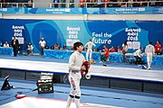 Deutsch: Fechten bei den Olympischen Jugend-Sommerspielen 2018: Tag 1, 7. Oktober 2018, Jungen, Säbel, Viertelfinale - Hibiki Kato (JPN) - Hyun Jun (KOR) 12:15 English: Fencing at the 2018 Summer Youth Olympics at 7 October 2018 – Boys' sabre Quarterfinals – Hibiki Kato (JPN) Vs Hyun Jun (KOR) 12:15