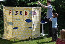 A Swedish "fishing pond" for children is used on many occasions, here on Midsummer's eve. Fiskdamm.JPG