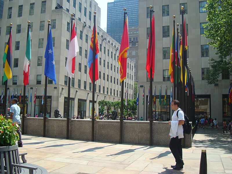 File:Flags around the ice rink - summer dining 3a.jpg