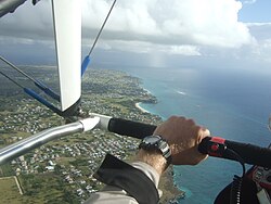 Foul Bay is Centre, with the Inner Reef to the Right, with surprisingly little surf on top. Squall coming. Green Point under the pilot's hand.