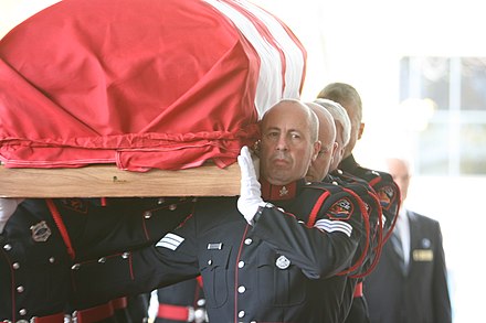 Hamilton Police Service guard of honour carrying Alexander's casket during his state funeral.