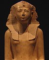 Женщина-фараон Хатшепсут, облачённая в немес.