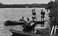 "Indians_canoeing_on_Miami_River_-_J.N._Chamberlain,_photographer,_Miami,_Fla._LCCN00650881_(cropped).jpg" by User:Tibet Nation