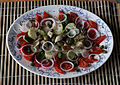 Insalata di Pantelleria con pomodoro, basilico, olive, cipolla, capperi, origano, olio d'oliva