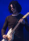 Colour photograph of Jack White performing live in 2009.