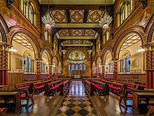 The Grade I listed King's College London Chapel on the Strand Campus was redesigned in 1864 by Sir George Gilbert Scott. King's College London Chapel 2, London - Diliff.jpg