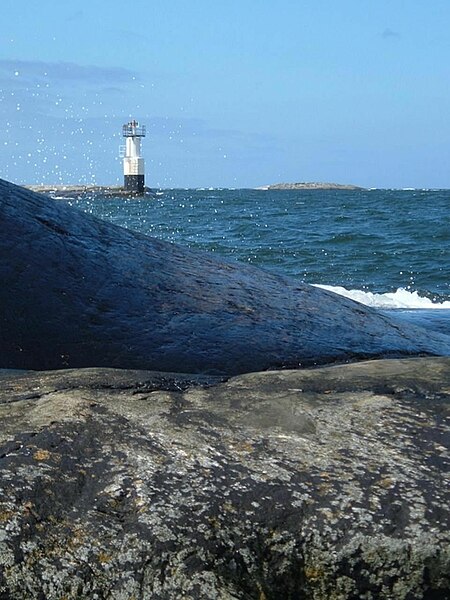 File:Light house from beach.jpg