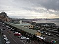 View across Pike Place Market to Elliott Bay; Pike Place and North Arcade in foreground.