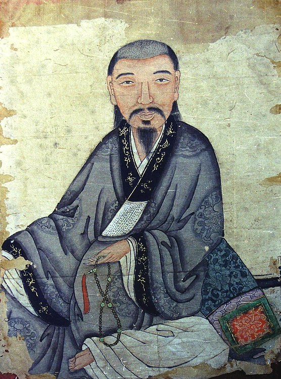 Portrait of Prince Tôn Thất Hiệp (Nguyễn Phúc Thuần) of Đàng Trong from the 17th century. He wears a áo tràng vạt (cross-collared robe).