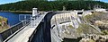 English: Mahinerangi Dam in Otago, New Zealand. 34m concrete arch dam, Lake Mahinerangi to the left. Panorama of three photos sitched with Hugin   This image was created with Hugin.