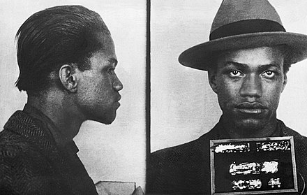 A Boston police mug shot of Malcolm, following his arrest for larceny.[20] (1944)