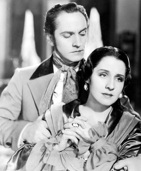 Film still with Norma Shearer and Fredric March.