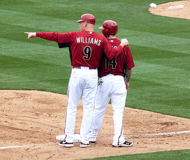 Matt Williams (left) serves as a third base coach for the Arizona Diamondbacks during a spring training game in February 2011