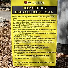 A warning sign form the City of Pasadena, California that was posted at the Oak Grove Park disc golf course Oak Grove Disc Course Covid Restrictions.jpg