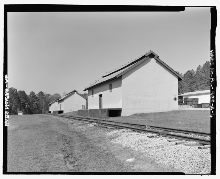 File:Oblique view of rear and south sides of ammunition storage buildings 4403 and 4404, view towards the north without scale - Fort McClellan Ammunition Storage Area, Building No. 4403, HABS AL-988-A-6.tif