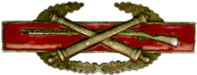 Example of a Combat Artillery Badge being created by pinning the artillery branch insignia over a Combat Infantryman Badge Oldcombatart.gif