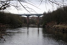 The west side; Radcliffe is to the left. Outwood viaduct from river irwell.jpg