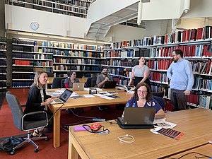 Participants in a March 2021 Wikipedia 'edit-a-thon' at the National Gallery of Australia Research Library Participants of the Know My Name Edit-a-thon at the National Gallery of Australia.jpg