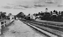 Railway Station at Cooran Queensland with Mount Cooran in the background, ca. 1926 Railway Station at Cooran Queensland with Mount Cooran in the background, ca. 1926.tiff