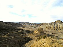 Missouri River Breaks, Montana - Isolated Butte in Bull Creek, and Road down to Cow Creek and Bull Creek