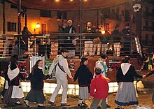 Holding hands in the traditional Saint Agatha's Eve (Altsasu) Santa Agenda 2004.jpg