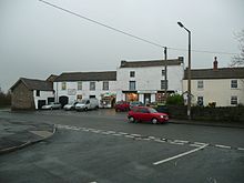 Dullage- The row of shops at the Frampton End Road/Church Road junction, believed to be the site of a Roman settlement in the village Shops at Frampton Cotterell.JPG