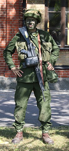 Soldier in m/1959 uniform with AK4. Soldat m59 Revinge 2015.jpg