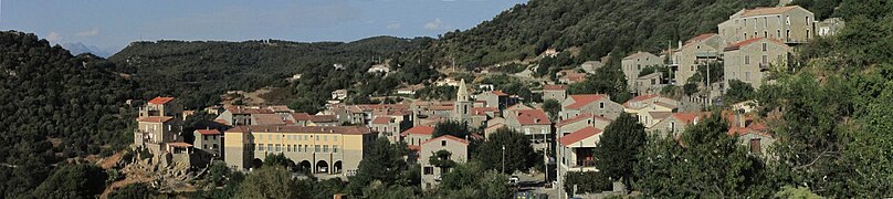 panorama of a village, a group of stone buildings on a spur.