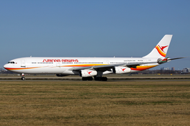 Suriname Airways A340-300 PZ-TCP AMS 2011-3-6.png