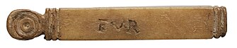 An example of a tesserae lusoriae inscribed with the Latin word fur, meaning "thief." Tessere - tessera lusoria, reglette, os - btv1b11357929z (1 of 2).jpg