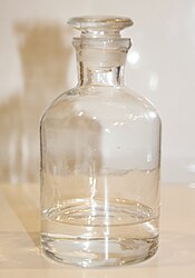 Photograph of a glass bottle of tetrahydrofuran