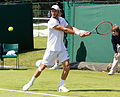 Tim Pütz competing in the first round of the 2015 Wimbledon Qualifying Tournament at the Bank of England Sports Grounds in Roehampton, England. The winners of three rounds of competition qualify for the main draw of Wimbledon the following week.