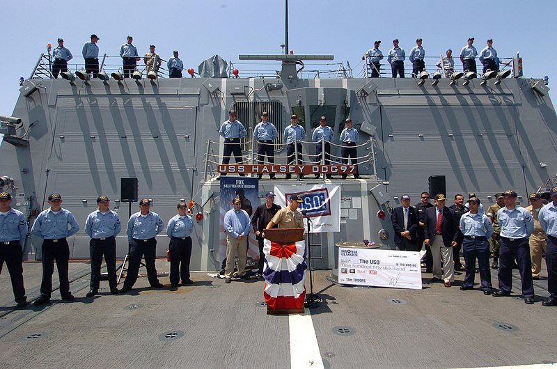 File:US Navy 050802-N-0685S-018 USS Halsey (DDG 97) Commanding Officer, Cmdr. James L. Autrey, welcomes Fox Home Entertainment, USO representatives and actress Pamela Anderson aboard the newly-commissioned guided missile destroyer.jpg