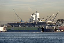 The amphibious assault ship USS Bonhomme Richard (LHD-6) in dry dock at NASSCO shipyard in San Diego. The 840-foot ship is the largest that can be accommodated in NASSCO's drydock. US Navy 101202-N-9643K-958 The amphibious assault ship USS Bonhomme Richard (LHD 6) is in dry dock at NASSCO Shipyard.jpg