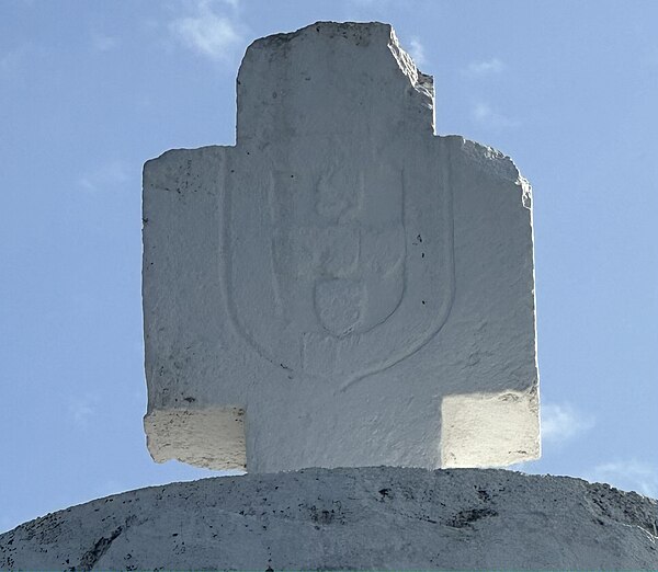 Limestone cross on the Vasco da Gama Pillar in Malindi displaying the coat of arms of Portugal