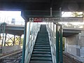 Exit sign to the 241st Street Bridge, as well as the Wakefield-241st Street Subway station east of here.