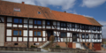 English: Half-timbered buildings in Wartenberg, Angersbach, Hainigweg 19 17 15 (from left to right), Hesse, Germany.