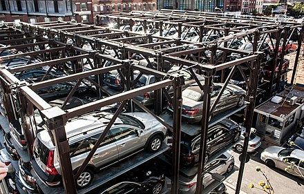 Parking lot in New York City with capacity multiplied by stacking with lifts