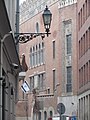 The Yiddish flag in front of a synagogue.