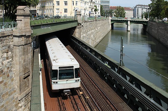 Vienna metro line U4 passes over a short bridge that non-perpendicularly crosses the Wien River just before and after going through tunnels