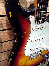 Early 1960s Stratocaster with rosewood fingerboard and three-ply pickguard. 1963 Fender Stratocaster ($4,200).jpg