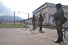 "Little green men" armed with AK-74Ms blockading Perevalne military base, 25 kilometres south of Simferopol, 9 March 2014 2014-03-09 - Perevalne military base - 0206.JPG