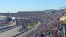 Daytona International Speedway 2017 Daytona 500 - Looking Westward Along Grandstands.jpg