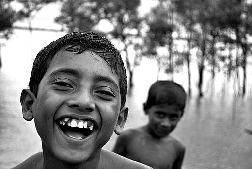Laughter, like that of these Bangladeshi children, is a typical expression of joy.
