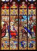 Vitral de la capilla que representa L'Adoration des mages así como las etapas precedentes y siguientes a su llegada a Belén (siglo XIX)