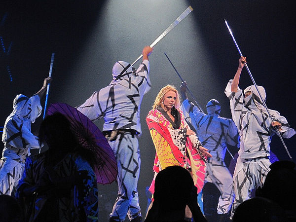 Spears performing In the Zone's second single "Toxic" during the Femme Fatale Tour in 2011