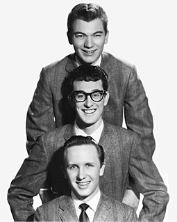 Buddy Holly and his band, the Crickets. Buddy Holly & The Crickets publicity portrait - cropped.jpg