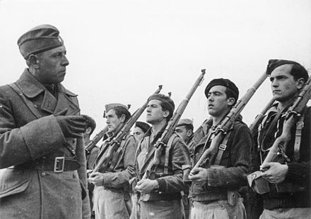 German officer from the Condor Legion instructing Nationalist infantry soldiers, Ávila