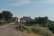 Vista de CM-5006, letrero de entrada en Marrupe y la localidad.